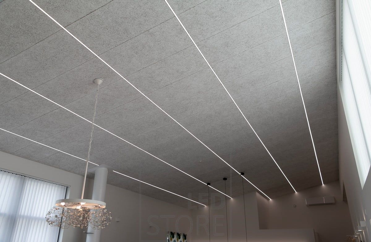 Living room general lighting with LED strips mounted on a narrow flush profile for a modern look